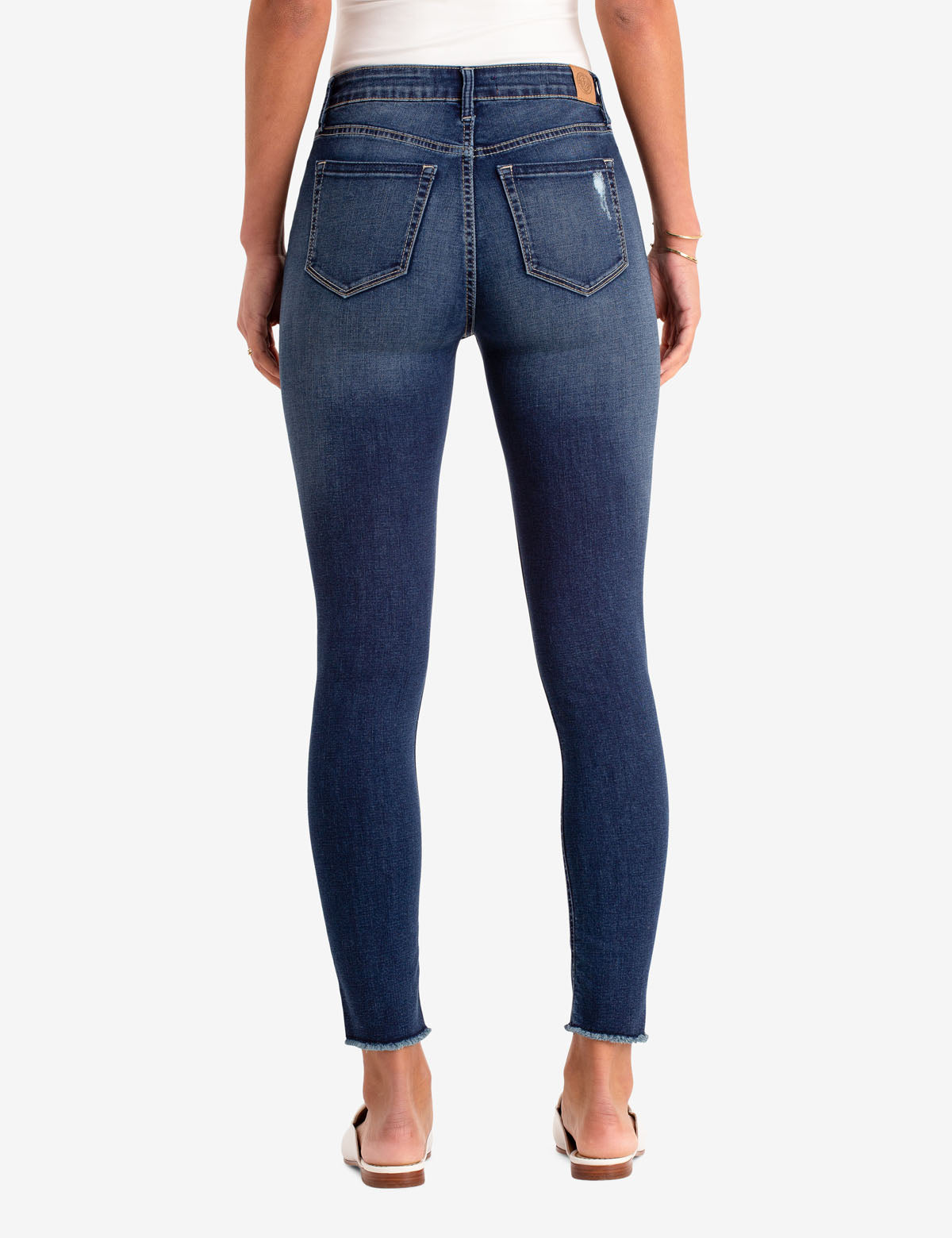 High-Rise Destructed Jegging with Repreve® Recycled Fabric | Slimming Fit