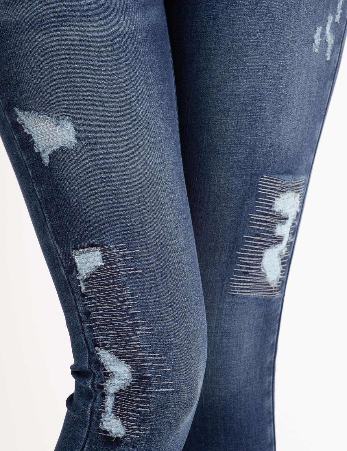 High-Rise Destructed Jegging with Repreve® Recycled Fabric | Slimming Fit